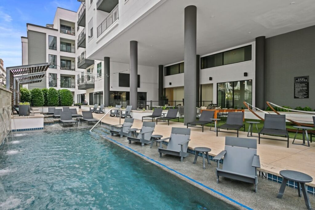 Pool with tanning ledge and deck seating