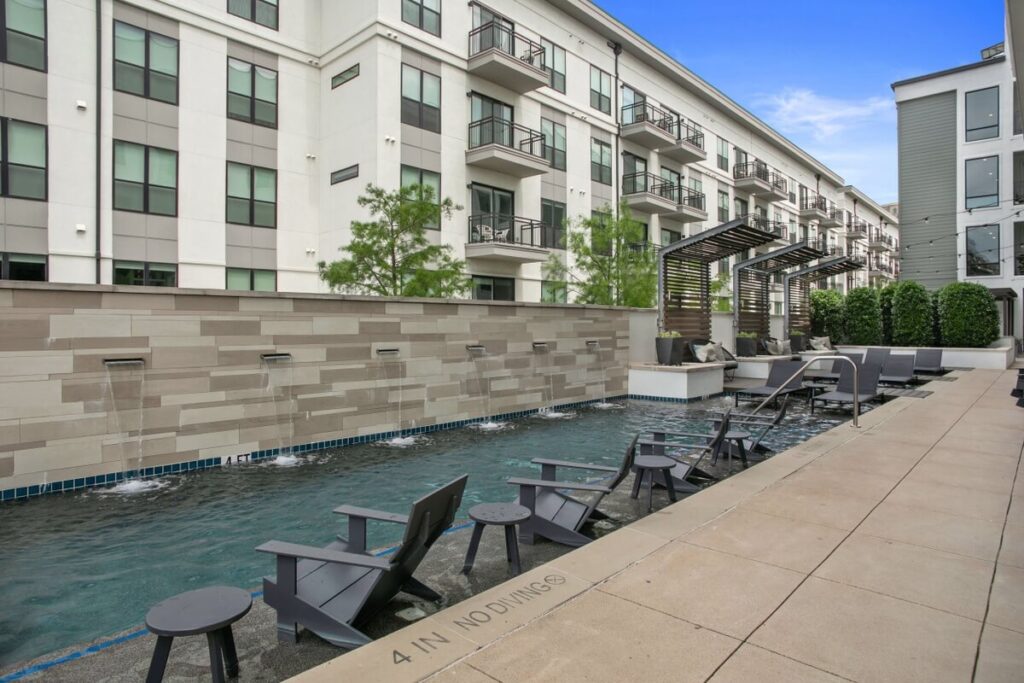 Pool with tanning ledge and deck seating